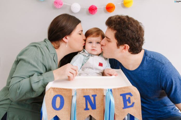 First birthday celebration moments with baby and parents, capturing memories with simple decorations